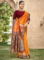 Orange Banarasi Silk Weaving Work Occasional Wear Saree SW889602